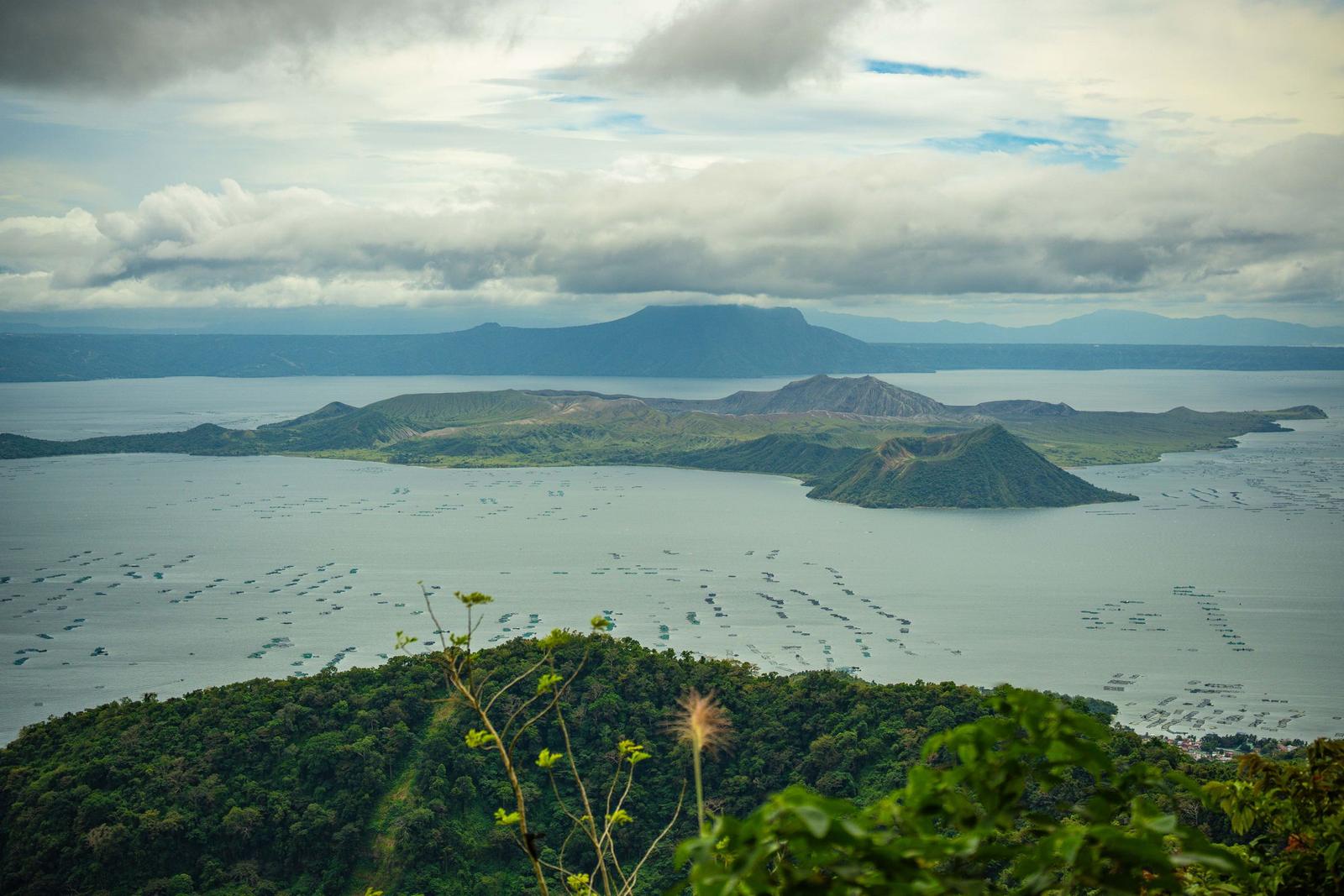 Taal Volcano island and Taal Lake seen from the ridge